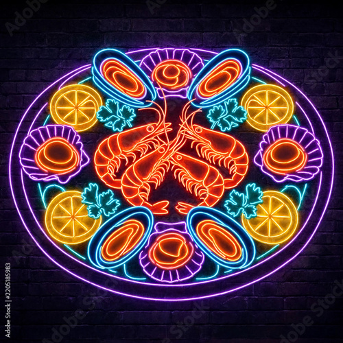 Neon sign depicting a seafood platter with shrimp mussels scallops and lemon slices