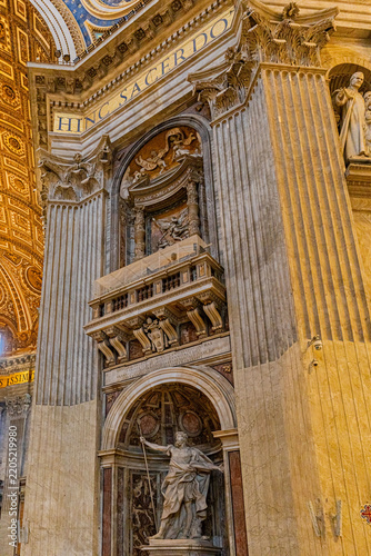 Monumental marble pier with sculptural niche and ornate interior decoration in Saint Peter's Basilica, Vatican City