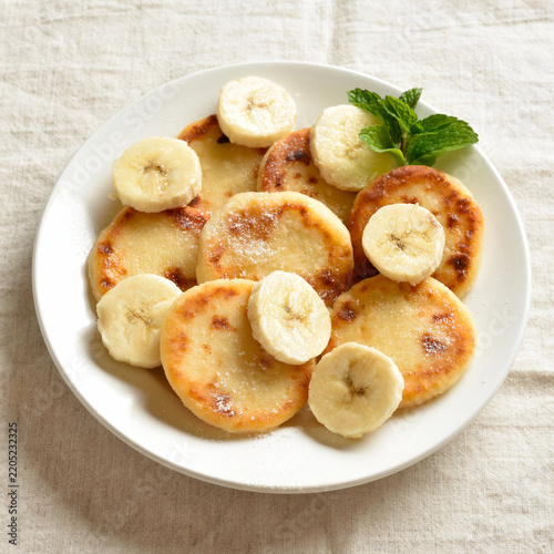 Delicious cottage cheese pancakes with banana slices