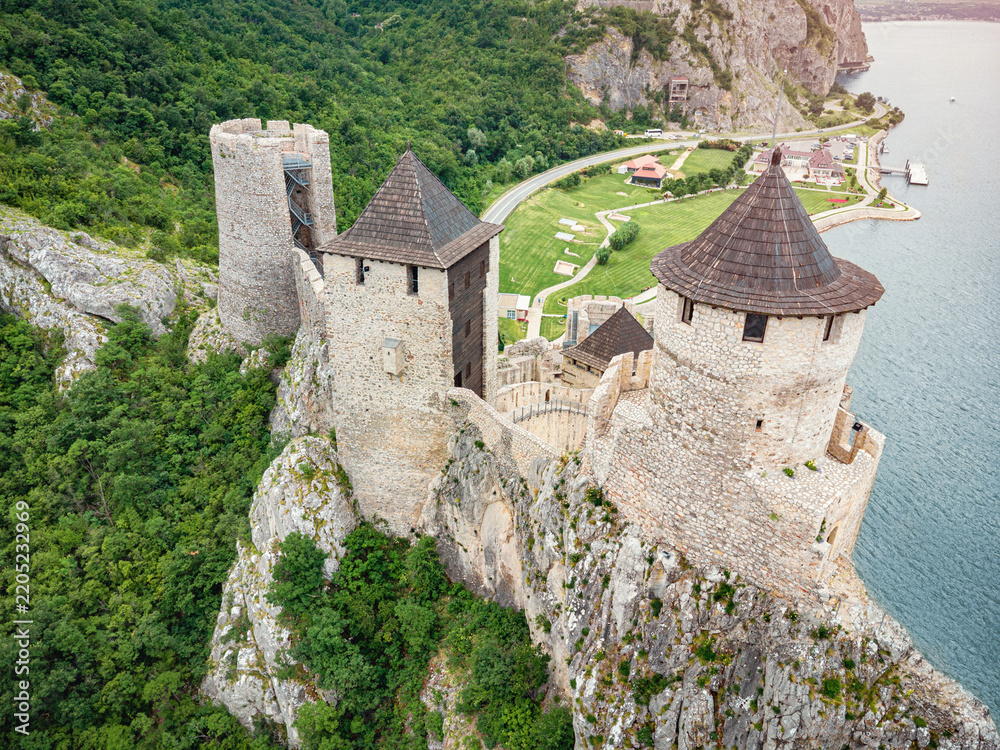 Fototapeta premium Aerial view of Golubac fortress, Serbia - centuries of defense and conquest written in stone at this Danube riverside stronghold