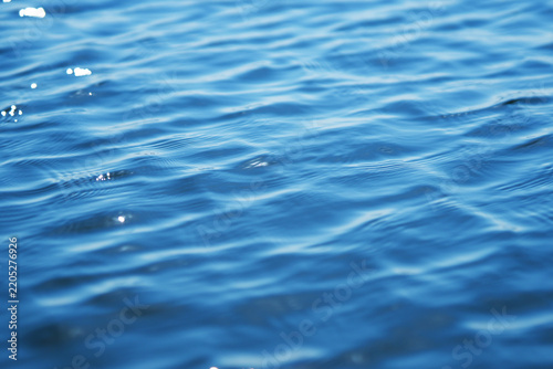 The glare of the water in the sea.