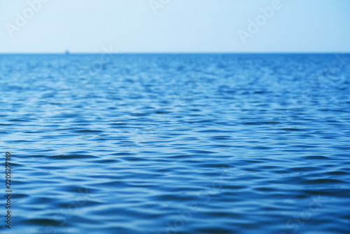The glare of the water in the sea.