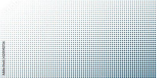 Abstract pattern of blue and white dots fading from solid to transparent, suggesting a digital or graphic design element.