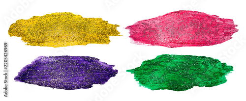  Colorful glitter paint smears in yellow, pink, purple and green with transparent background and copyspace, isolated sparkly brush stroke cutout. 