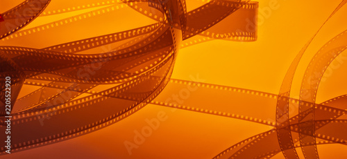 Abstract multicolored cinematic background with film strip