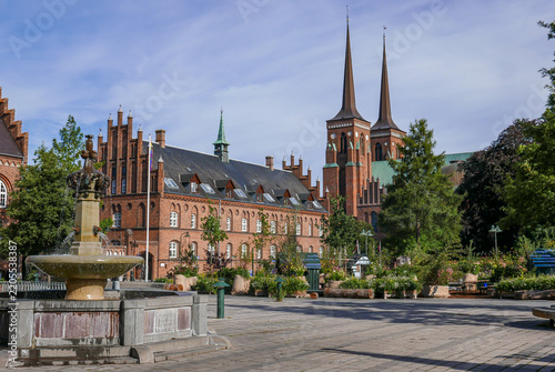 Roskilde, Denmark, 08.04.2026: view of the historic town square, featuring the iconic twin spires of the Cathedral in the background. 
