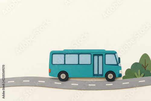 Teal Paper Bus on a Curved Road with Copy Space