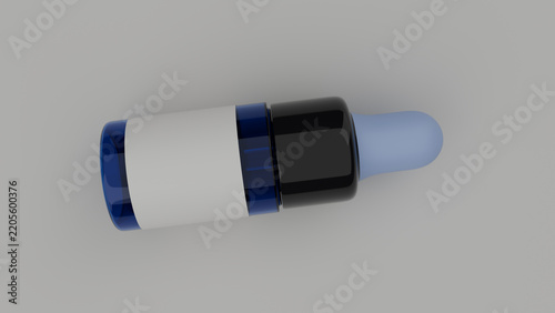 Blank blue glass dropper bottle flat lay from above on grey