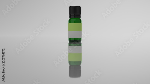 Green glass essential oil bottle with mirror reflection on white