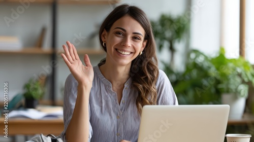 Happy Woman Waving During Remote Video Meeting