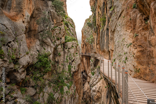 ooden boardwalk clinging to sheer canyon walls at Caminito del Rey, Spain