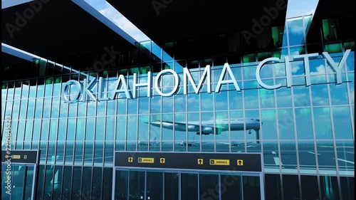 Airlane landing at Oklahoma City, USA. Arrival in the city with reflection of airport and aircraft