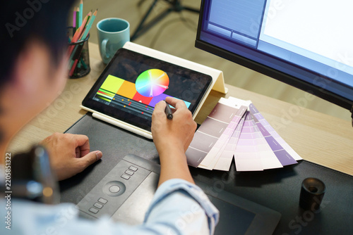 Hands, man and graphics tablet for drawing, editing design and development with pen in office. Stylus, designer and pad at creative startup for digital art, sketch review and business project