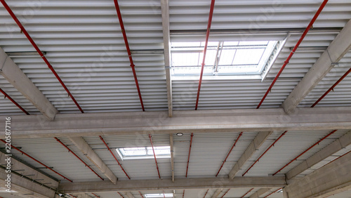 Steel roof deck and rooflight inside a new industrial hall