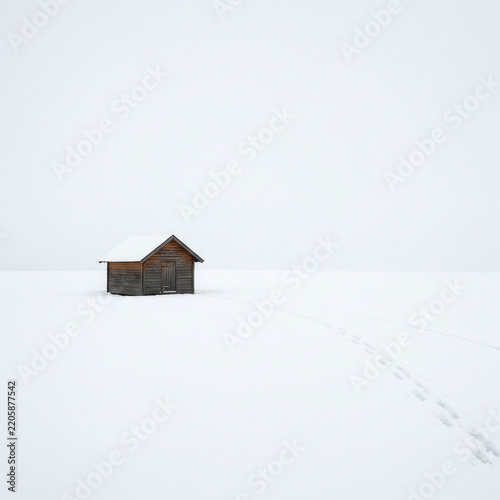 house in snow on white back griund
