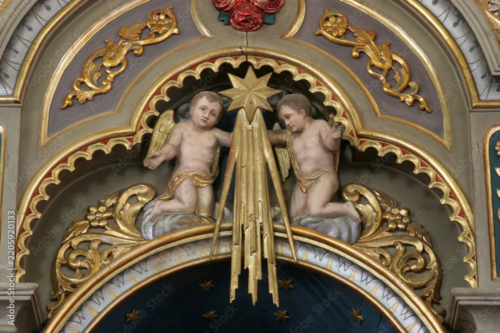 Obraz premium Angels, statue on the Altar of the Three Kings in the parish church of the Sacred Heart of Jesus in Velika Pisanica, Croatia