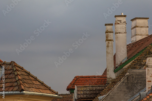 Fotografie Historic rooftops chimneys architecture