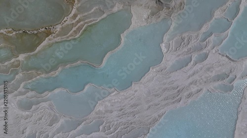 Aerial view of breathtaking natural site of white travertine thermal terraces, Pamukkale, Türkiye	
