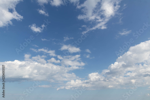 Sky replacement blue sky and puffy white clouds floating