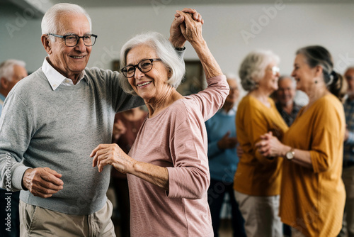 Happy Senior Couple Dancing Together at a Social Gathering