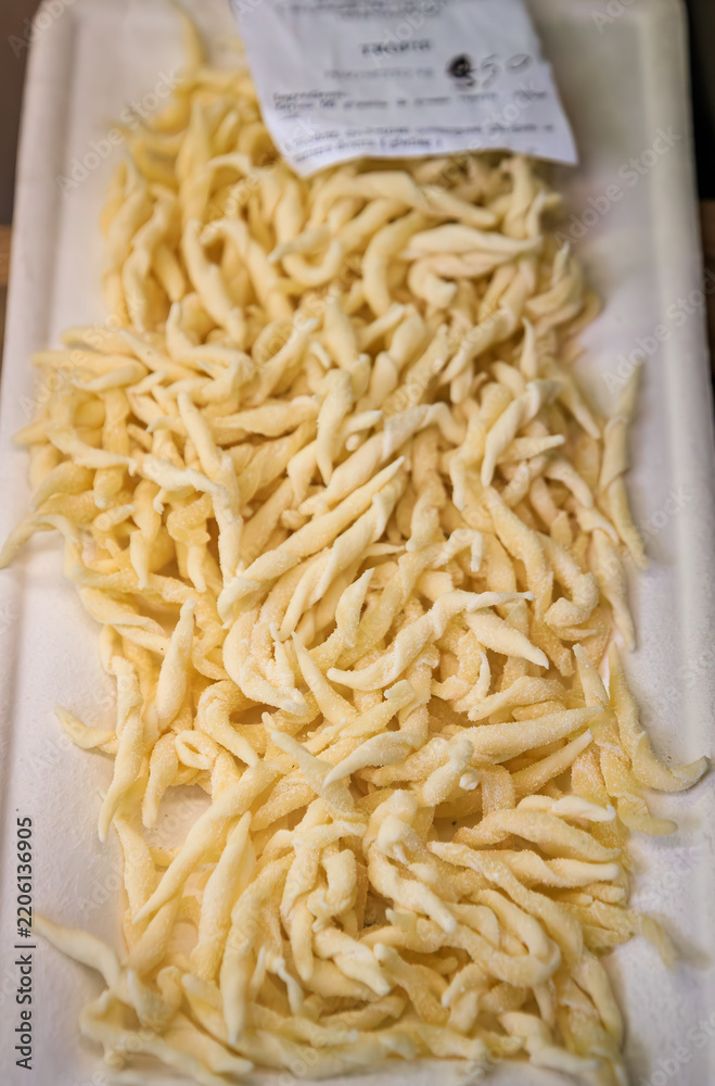 Fototapeta premium Fresh trofie, traditional Ligurian pasta at a farmers market in Sanremo, Italy