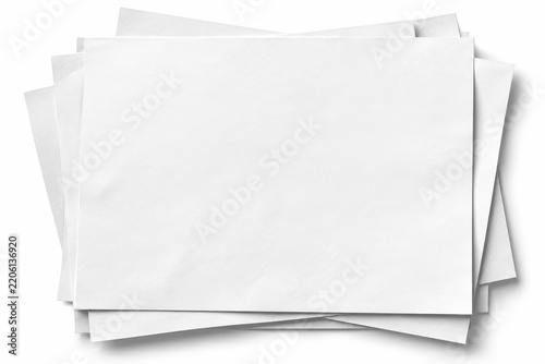 Stack of blank white paper posters in layered arrangement, top view advertising mockup with copy space for brand campaigns and promotional layouts