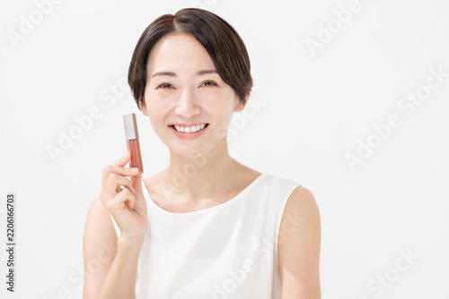 Bild auf Leinwand 化粧品を持つ女性