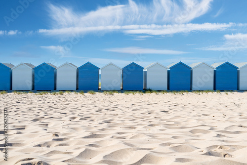 Colorful Beach Huts on the Sandy Beach in Charmouth, England