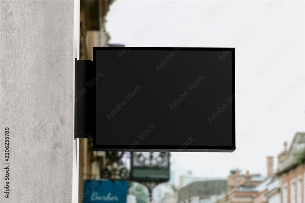 Fototapeta premium Blank outdoor signboard mounted on building facade