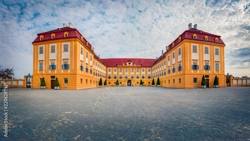 Attractive summer view of Hof castle, 18th century Habsburg complex including a farm with restored state rooms and ornamental grounds. Gorgeous morning scene of Schloshof park, Austria, Europe.