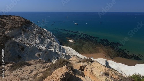 peaceful mediterranean beach scene with clear water at Scala dei Turchi, Sicily