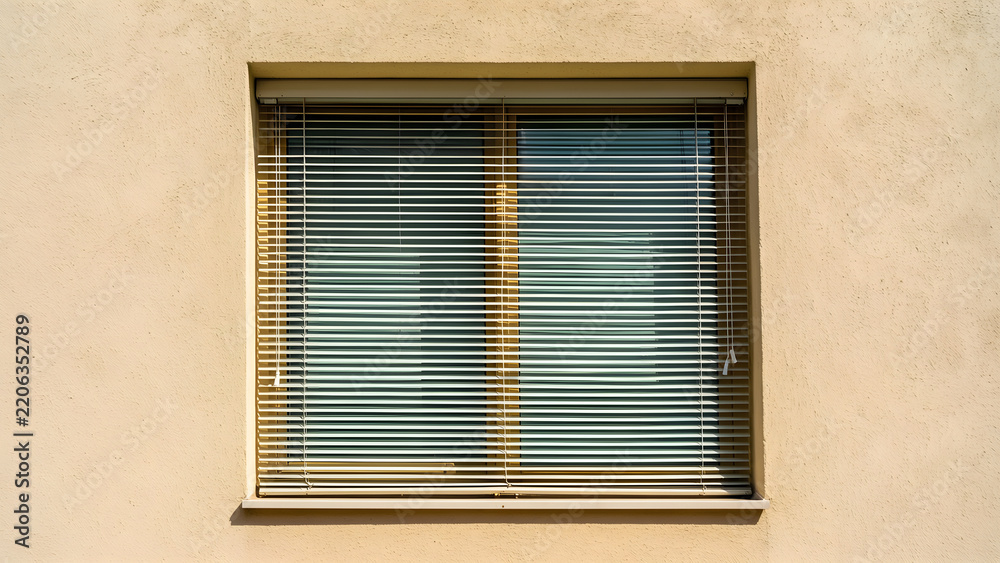 Fototapeta premium Clear commercial arrangement of exterior adjustable shade louvers casting controlled shadow across a window, reduced to an adaptable high-clarity campaign composition for heat adaptation and passive