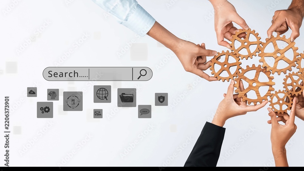Obraz premium Hands of diverse individuals unite over interlocking gears, symbolizing teamwork and collaboration in a business setting, fostering innovation and problem-solving skills. Raster