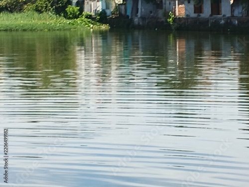calm pond water with natural reflections and gentle ripples