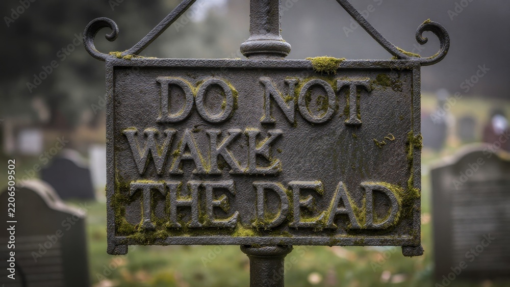 Fototapeta premium Spooky Cemetery Sign Warning Not to Wake the Dead in Foggy Atmosphere