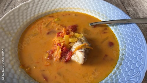 Fish in Tomato Soup Served in Restaurant