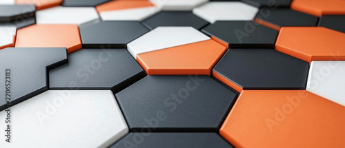 Textured interlocking orange, black, and white hexagonal tiles creating a modern geometric pattern with subtle depth