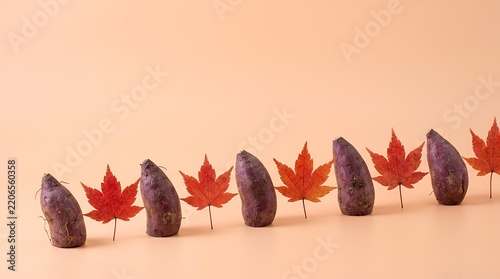 さつまいもと赤い紅葉を交互に並べた秋のパターン