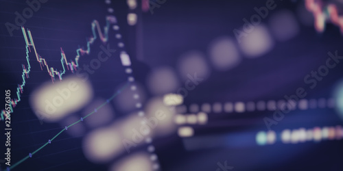 Abstract financial background with stock market candlestick chart and modern bokeh effect.