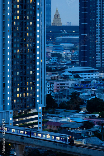 High-angle view of the Bangkok skyline at sunset.