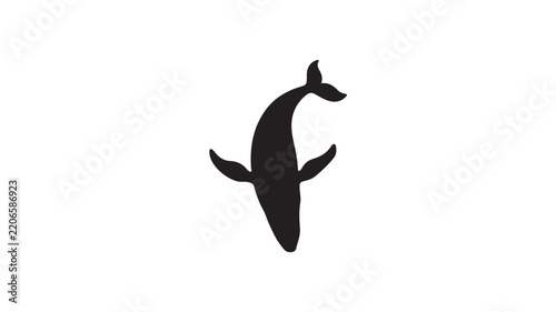 Minimalist black whale silhouette swimming against white background showing marine life design