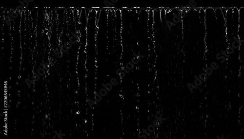 Abstract Waterfall Effect with Falling Water Droplets and Streams Against a Black Background