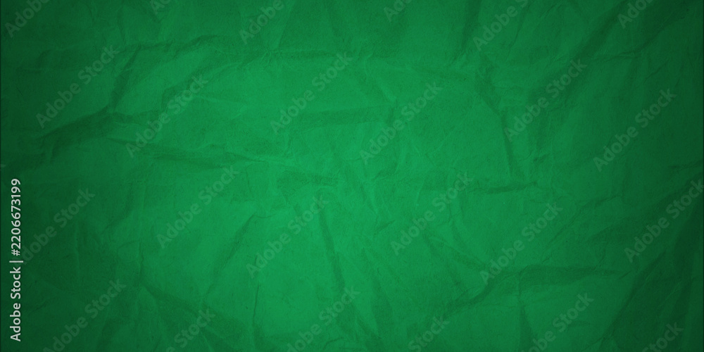 Obraz premium A background made of crumpled green paper