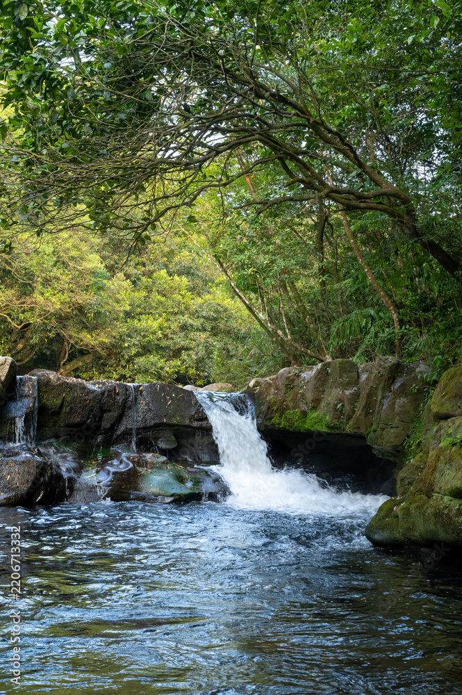 Obraz premium Little waterfall in Hubaotan Scenic Area, in New Taipei City, Taiwan.