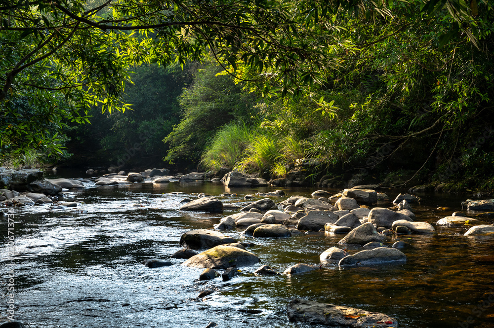 Fototapeta premium Relax scene by the riverside of Hubaotan Scenic Area, in New Taipei City, Taiwan.
