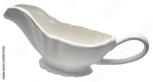 Obraz na plátně Elegant white ceramic gravy boat isolated on a clean background for culinary pre