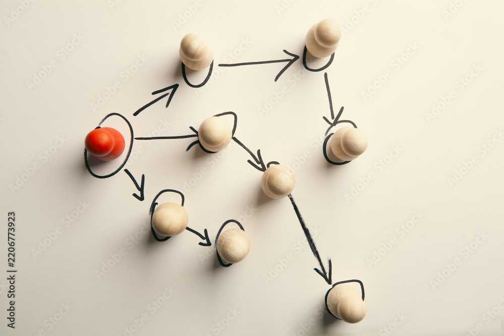 Obraz premium Conceptual image of teamwork. Group of people linked together by rope