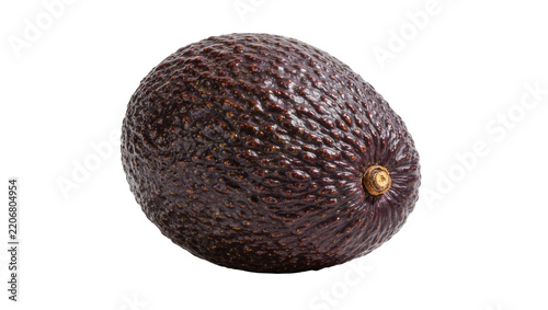 Dark bumpy skinned Hass avocado with stem, isolated on transparent background
