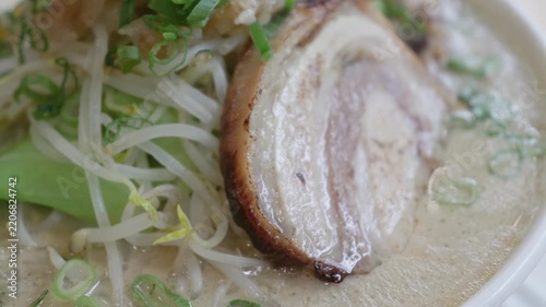 Close up of sliced pork in a bowl of Japanese ramen