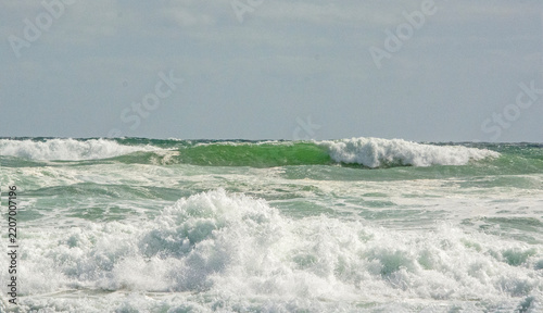 wave breaking on the beach